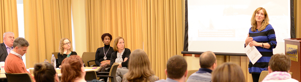 A speaker presenting to a group of students of the Ed.D. 2015 cohort